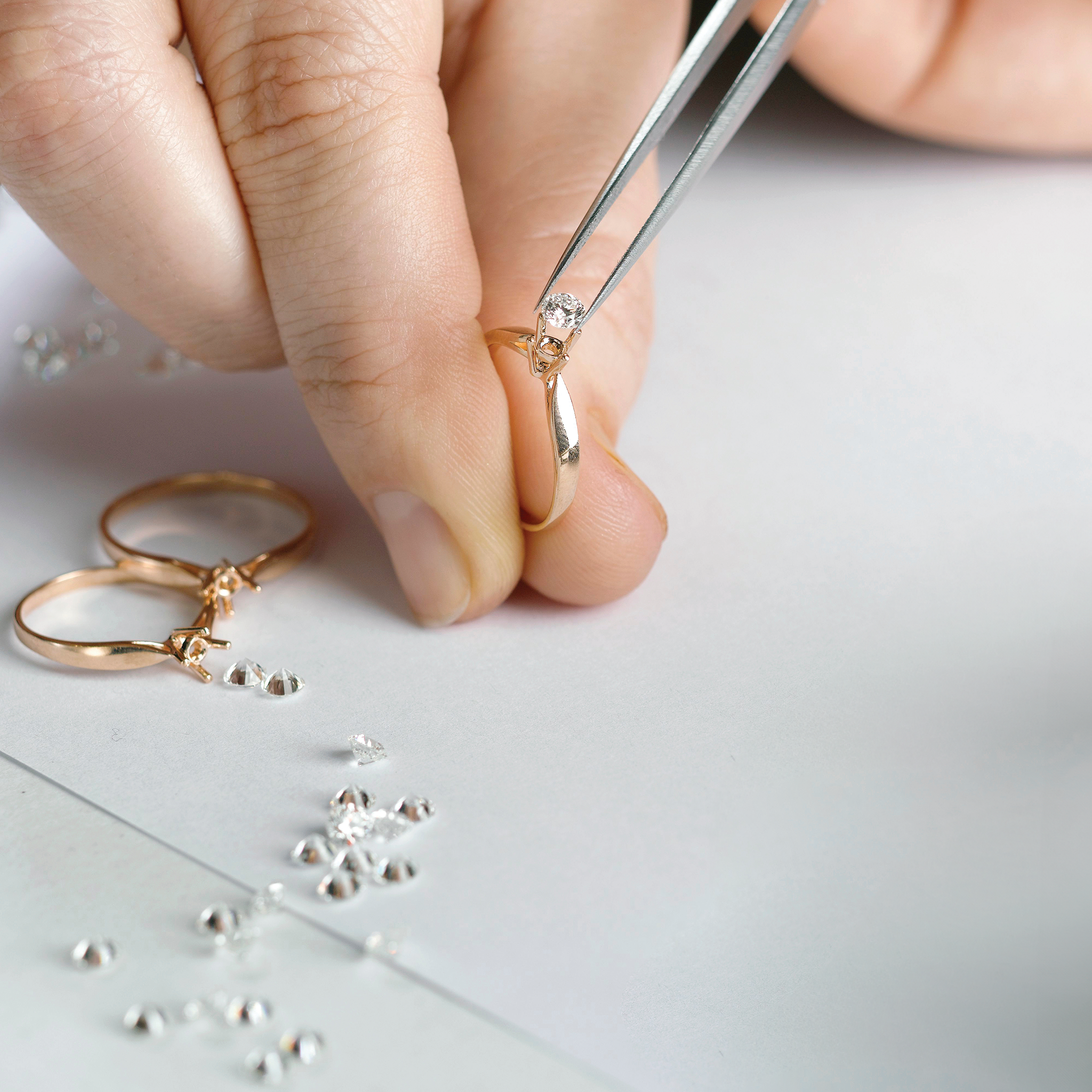 Goldsmiths creating a wedding diamond ring