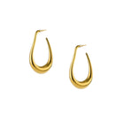 Gold hoop earrings on a white background