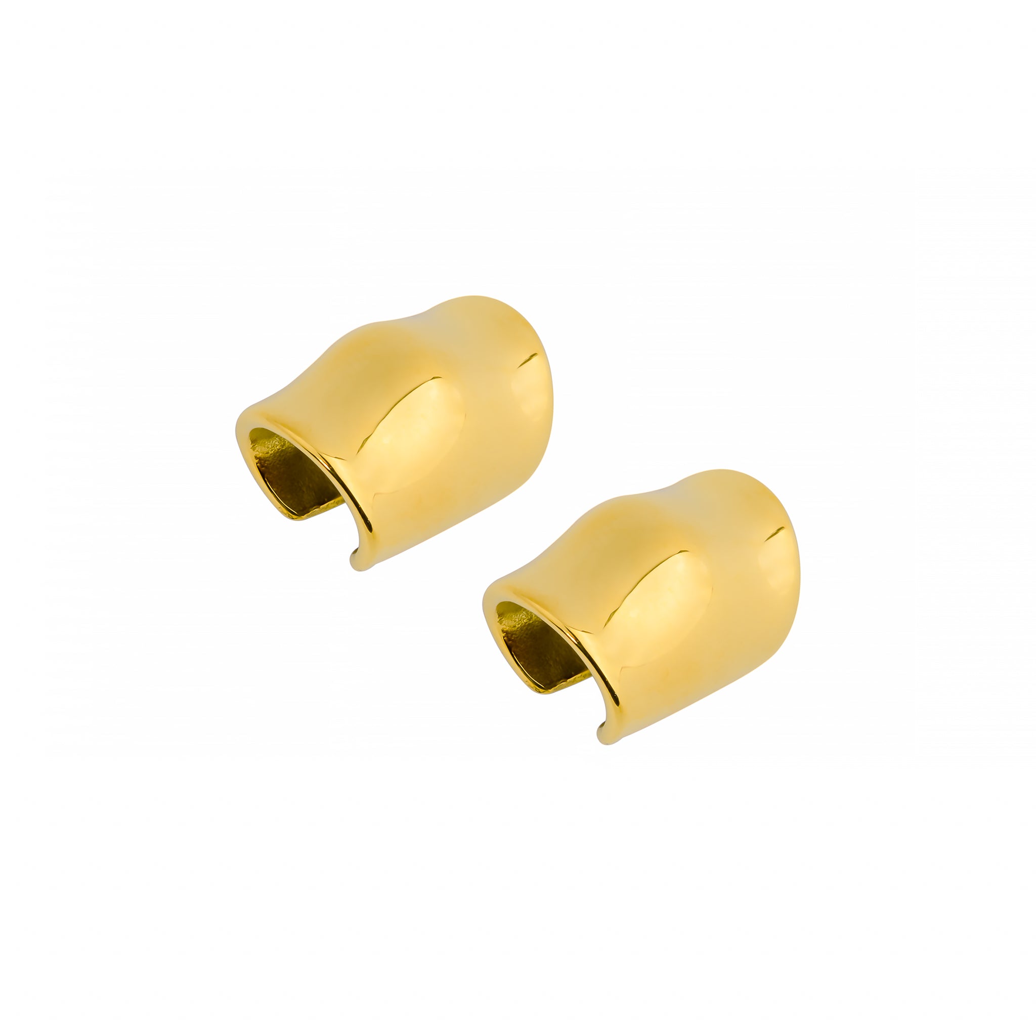 Close-up view of 18K gold plated ear cuffs, showcasing their smooth, wavy, and contemporary design with a glossy finish