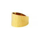 A textured 18k gold-plated wide band ring featuring a distinct brushed design, crafted for bold elegance and luxurious appeal.