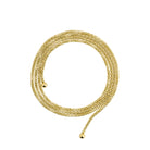 A luxurious, gold-plated, adjustable long chain accessory featuring intricate ball-end detailing, designed for versatile styling.