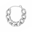 Silver plated chunky chain link choker with a bold design, featuring a thick interwoven structure and a polished finish, laid flat against a white background.