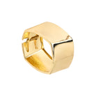 Close-up view of an gold-plated wide cuff bracelet, featuring a sleek, polished surface with a sturdy clasp mechanism, showcasing its modern, bold design and reflective finish.