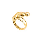 Close-up of the 18K gold-plated multi-band ring featuring bold, spherical accents, showcasing its contemporary design and luxurious golden finish.