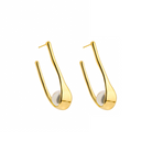 18K gold-plated drop earrings featuring a sleek, curved design with a pearl accent nestled at the base, showcasing a minimalist and elegant aesthetic.