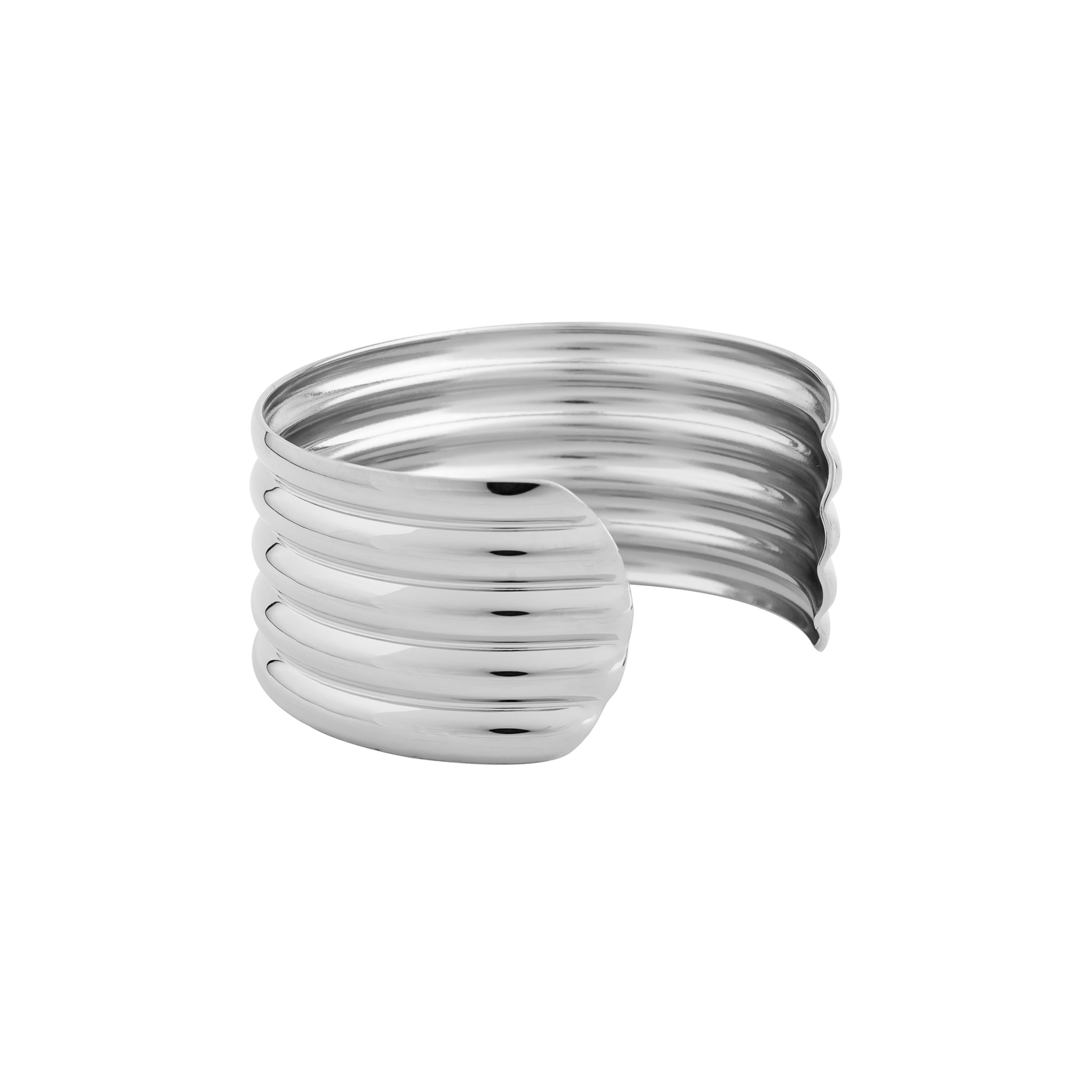 Silver plated cuff bracelet featuring a sleek, ribbed design with a high-polish finish, creating a statement accessory that exudes modern elegance.