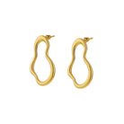 Gold hoop earrings on a white background
