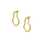 Gold hoop earrings on a white background