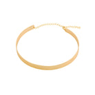 A sleek, polished gold choker with a smooth, reflective surface and a delicate adjustable chain clasp, shown on a white background.
