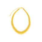 18K gold-plated statement necklace with a textured design, featuring layered cylindrical accents arranged in a radiant pattern.