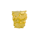 A textured, wide 18K gold ring with an organic, molten finish, reflecting bold individuality.